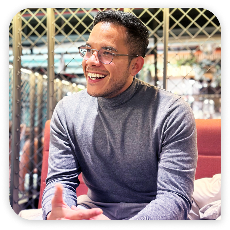 Contact us page hero image of Gerson Lozano talking and smiling